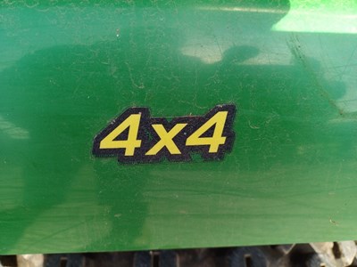 Lot 40 - John Deere x748 ultimate 4x4 ride on mower with the edge cutting deck and mcs 580h grass collector