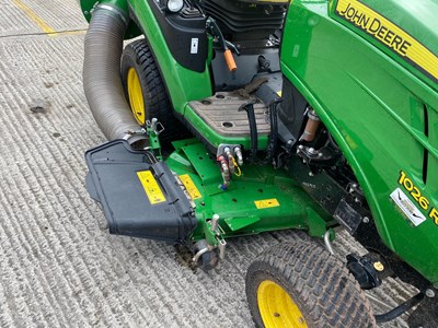 Lot 33 - John Deere 1026 r ride on mower with auto connect 54d cutting deck and mcs580h grass collector